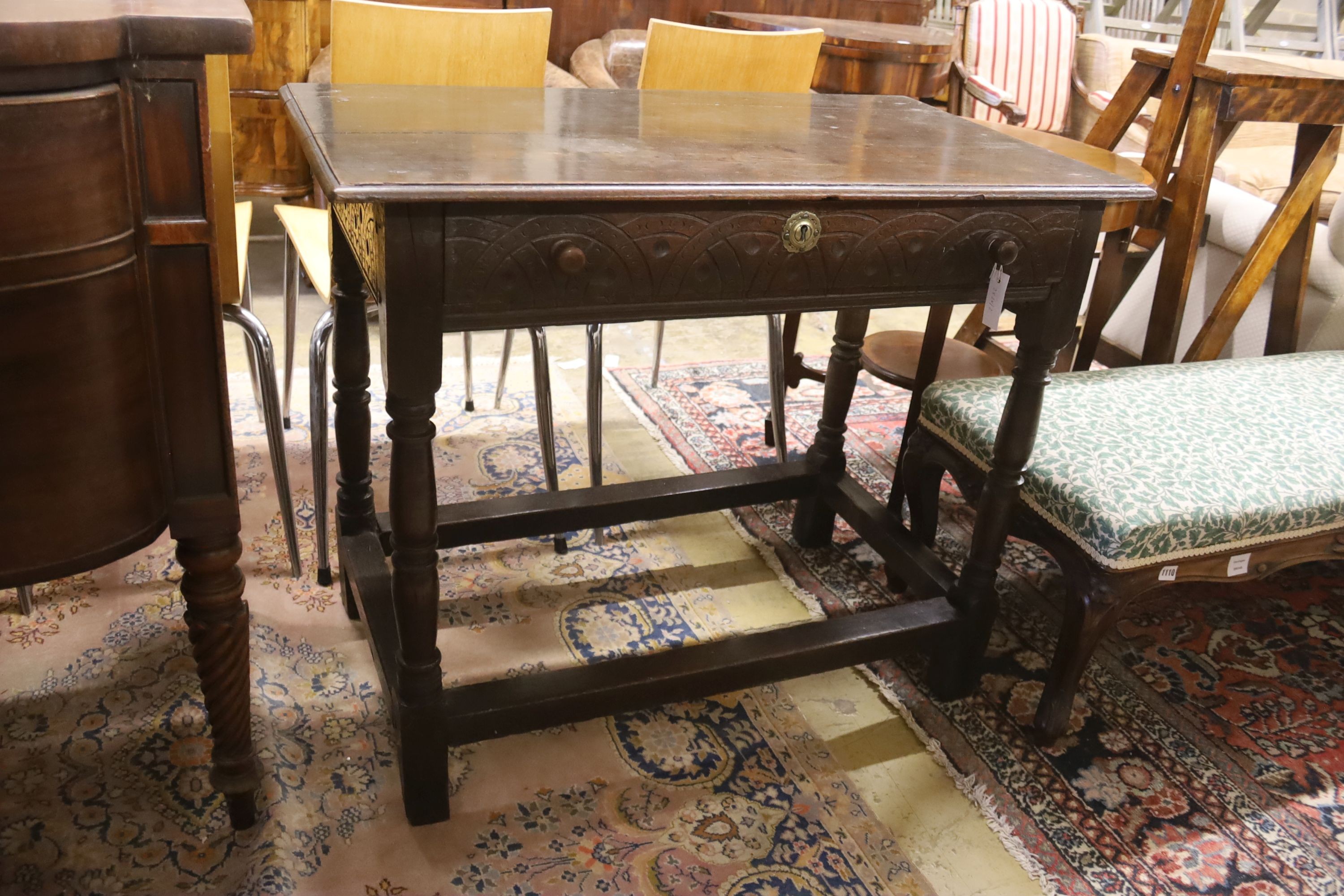 A 17th century oak side table, width 99cm, depth 55cm, height 80cm